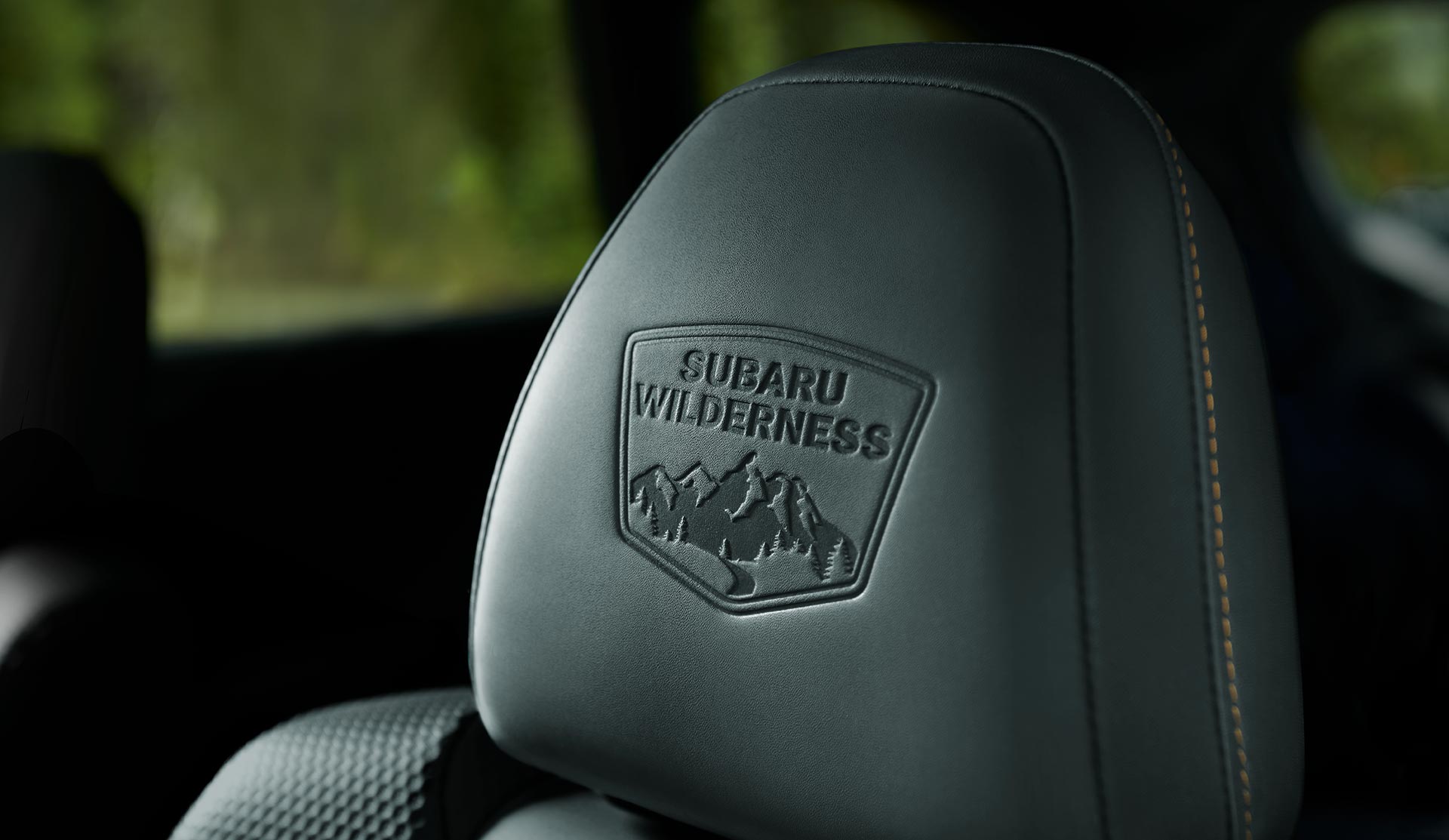 2025 Subaru Outback Wilderness Close shot of Wilderness logo embossed headdress.