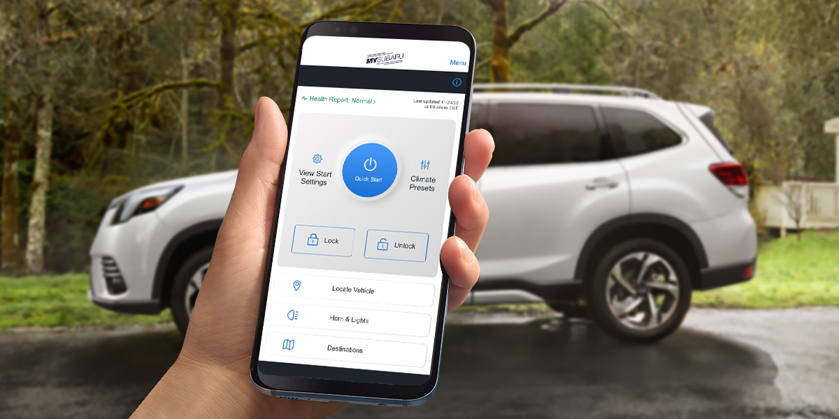 Hand holding phone with MySubaruTM App